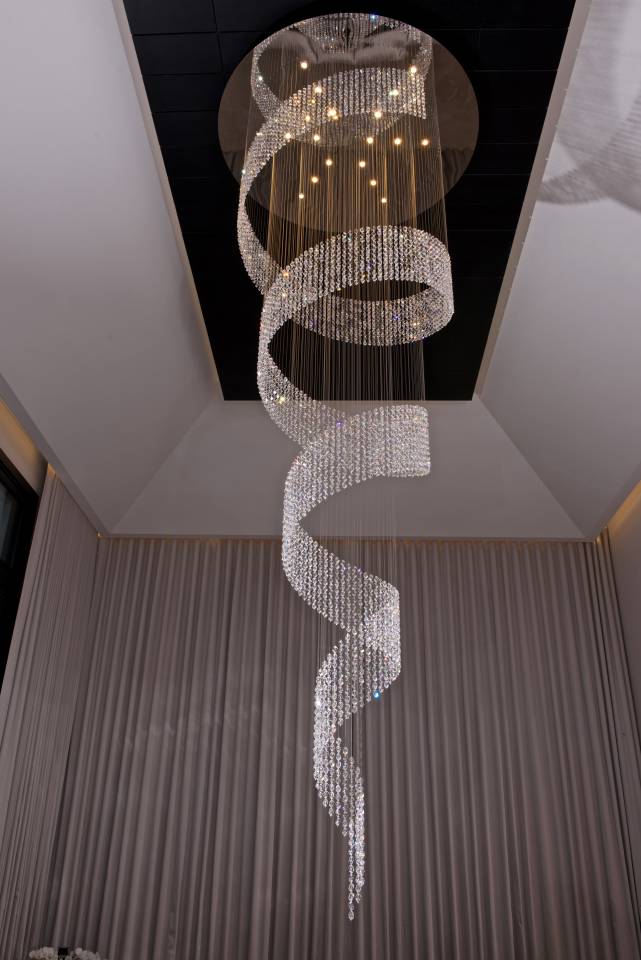 CONTEMPORARY CRYSTAL ‘TWIST’ CHANDELIERS