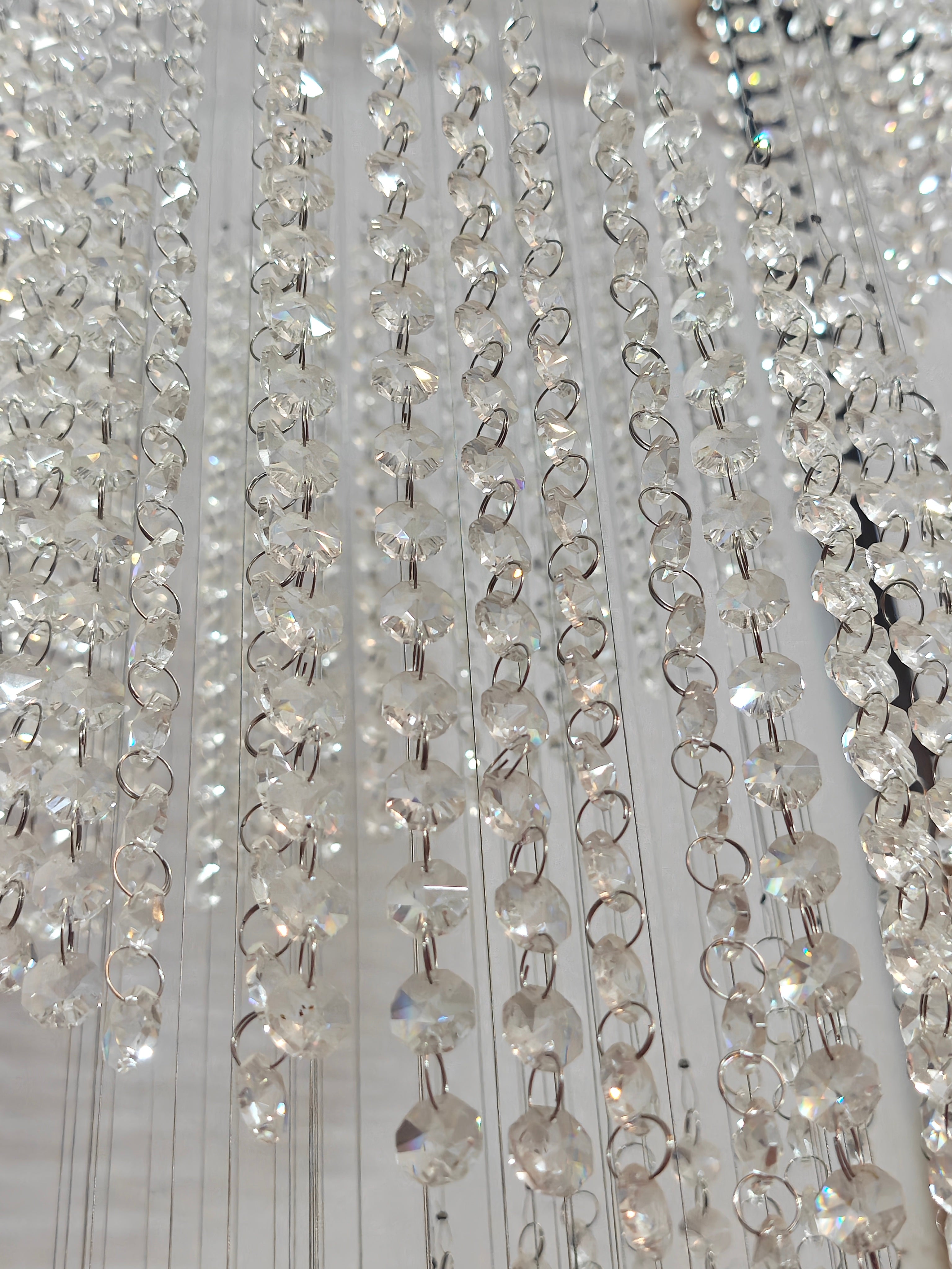 Contemporary Crystal ‘Twist’ Chandeliers